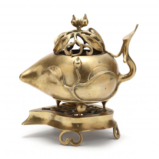 A CHINESE BRASS PEACH FORM CENSER