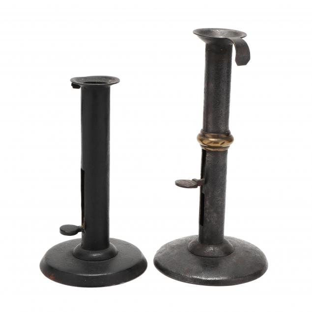 TWO ANTIQUE HOGSCRAPER CANDLESTICKS