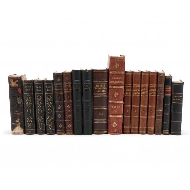 EIGHT LEATHER BOUND BOOKS IN LATIN 34b6e0