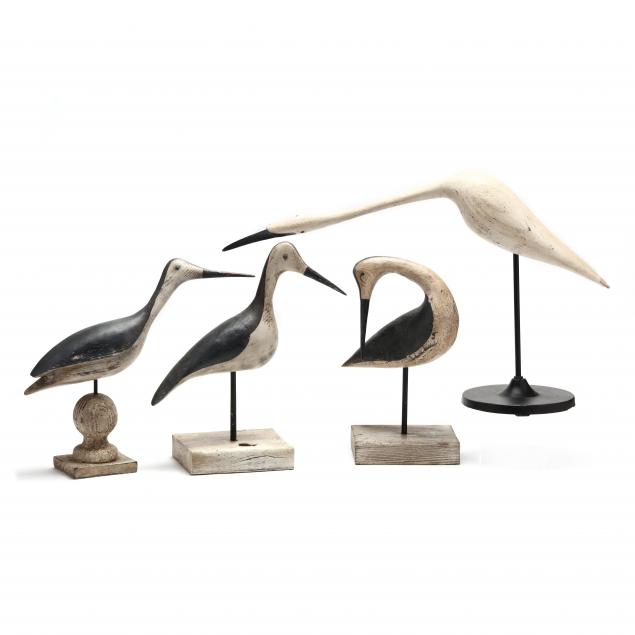A GROUP OF FOUR CARVED WOOD SHOREBIRDS