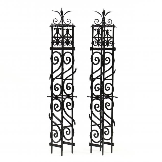 PAIR OF SPANISH STYLE CAST AND