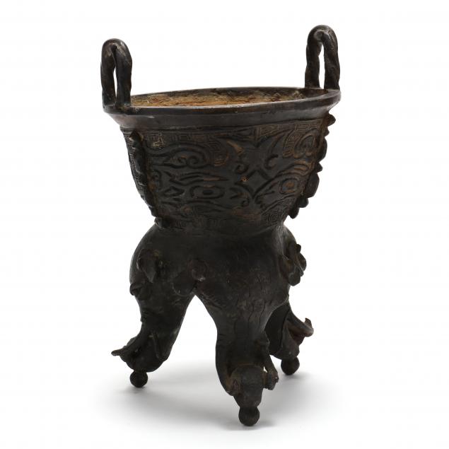 AN ASIAN BRONZE CENSER Raised 34b8fe