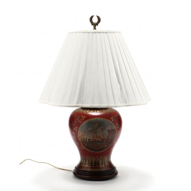 A DECORATIVE TABLE LAMP WITH PAINTED