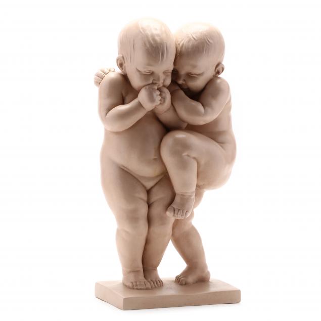 VINTAGE SCULPTURE OF TWO BABIES