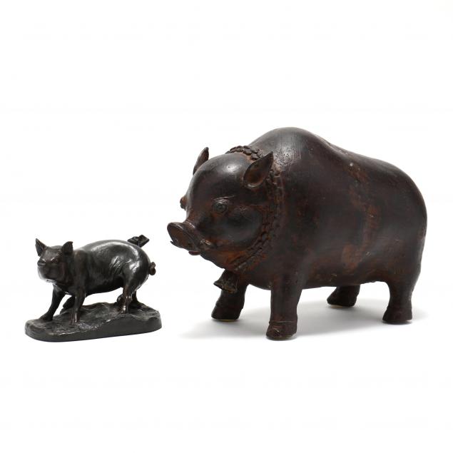 TWO CONTEMPORAY PIG SCULPTURES  34ba9a