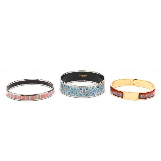 THREE PRINTED ENAMEL BRACELETS  34bb6b