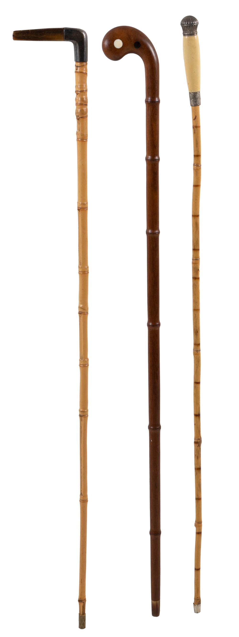 THREE CANES WALKING STICKS LATE 34c055