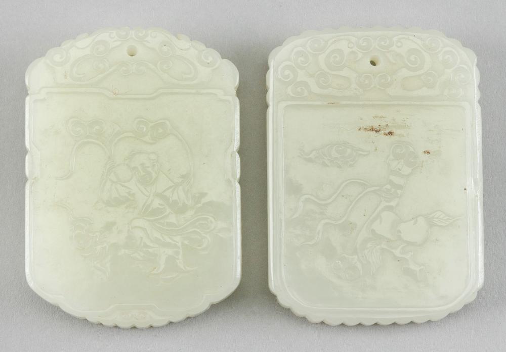 TWO CHINESE CARVED JADE PENDANTS 34c2a2