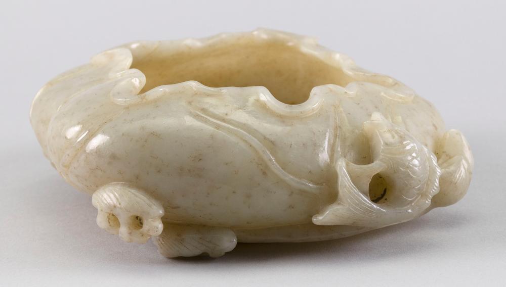 CHINESE CARVED MUTTONFAT JADE COUPE