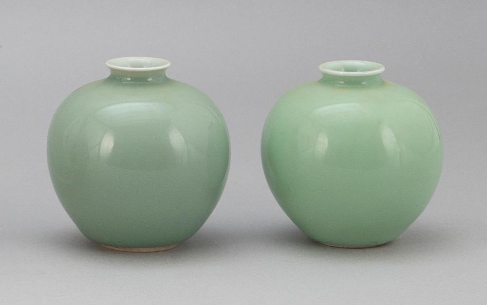 NEAR-PAIR OF CHINESE CELADON PORCELAIN