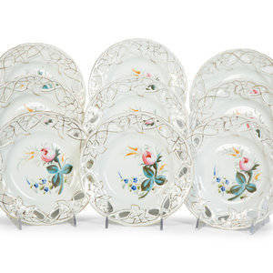 Nine English Porcelain Luncheon Plates