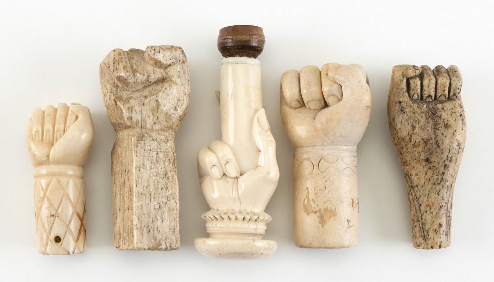 COLLECTION OF BONE AND IVORY CLENCHED