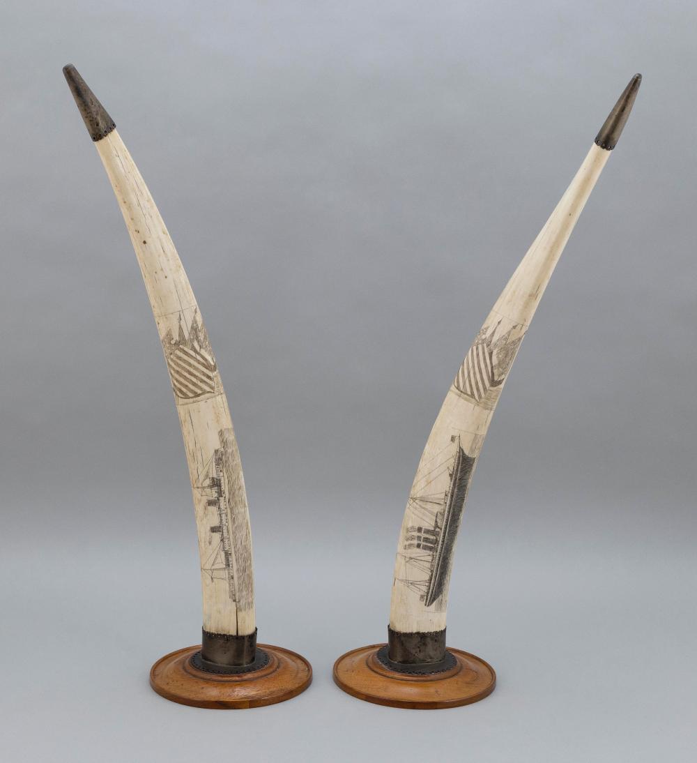 PAIR OF POLYCHROME SCRIMSHAW WALRUS