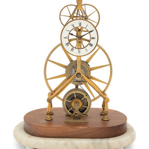 A Brass Skeleton Clock
20th Century
having