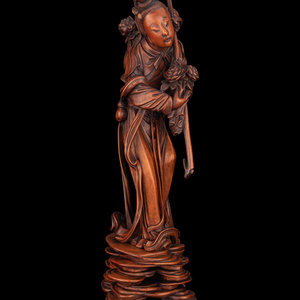 A Chinese Boxwood Figure of a Female