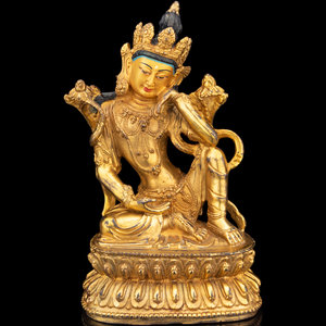 A Sino-Tibetan Gilt Bronze Figure