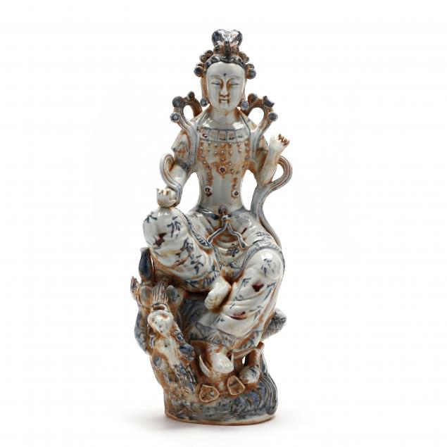 A CHINESE BLUE AND WHITE PORCELAIN GUANYIN