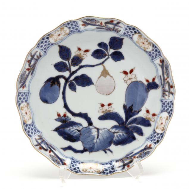 A JAPANESE IMARI PLATE WITH AUBERGINES