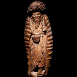 A Japanese Carved Bamboo Figure