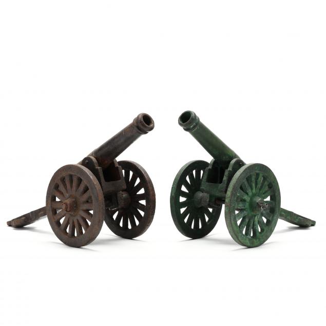 TWO IRON MINIATURE CANNONS  Second