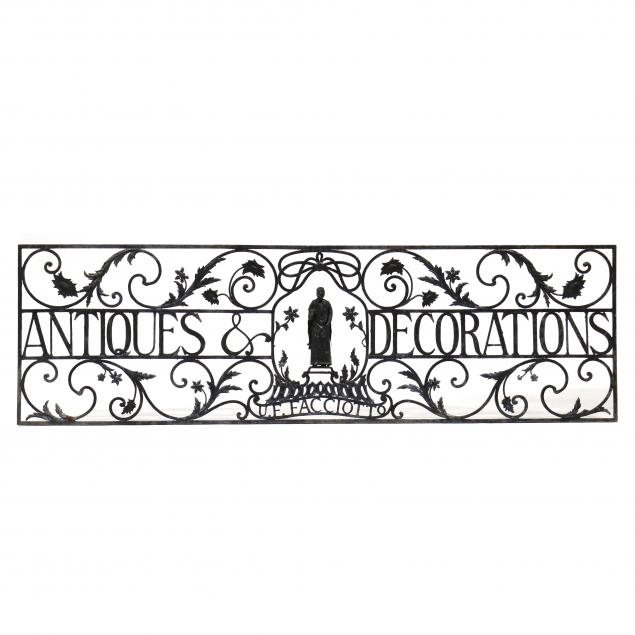 A VINTAGE HAND-WROUGHT IRON ANTIQUES