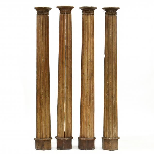 FOUR CONTINENTAL CARVED WOODEN PILASTERS