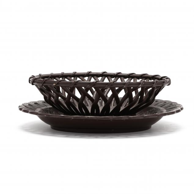  A RETICULATED POTTERY FRUIT BASKET