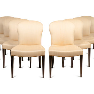 A Set of Eight Saddle Dining Chairs
Second