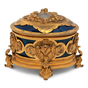 A French Gilt Bronze and Enamel