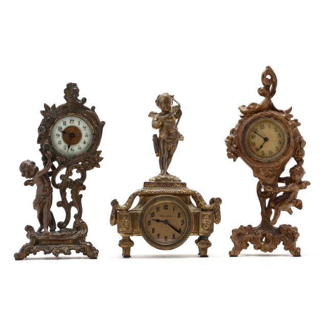 THREE ANTIQUE FIGURAL DESK CLOCKS 34aeaf