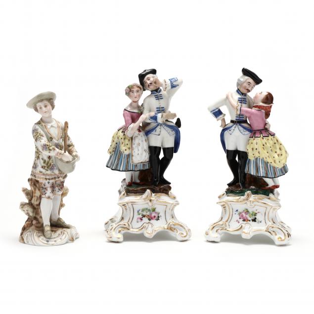 THREE PORCELAIN FIGURINES A pair 34af93