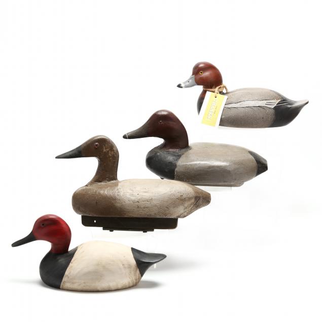 FOUR UNSIGNED PAINTED WOODEN DECOYS