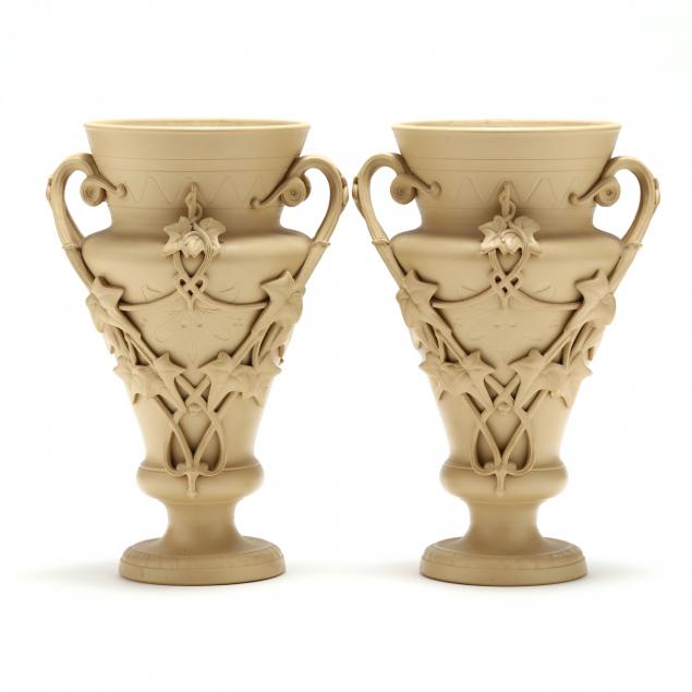 A PAIR OF CANEWARE GARDEN VASES