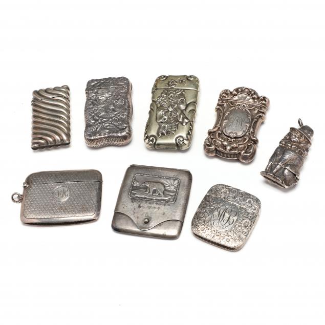 A COLLECTION OF EIGHT SILVER MATCHSAFES 34b2f0