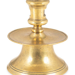 A Continental Brass Capstan Candlestick Likely 34db6b