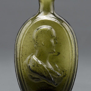 An Olive Green Glass Portrait Bust