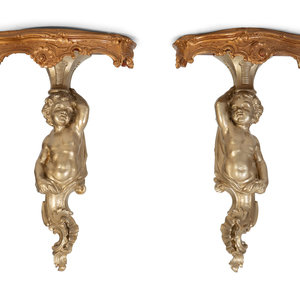 A Pair of Gilt and Silvered Wood