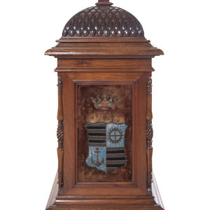 A Continental Carved Mahogany Cabinet