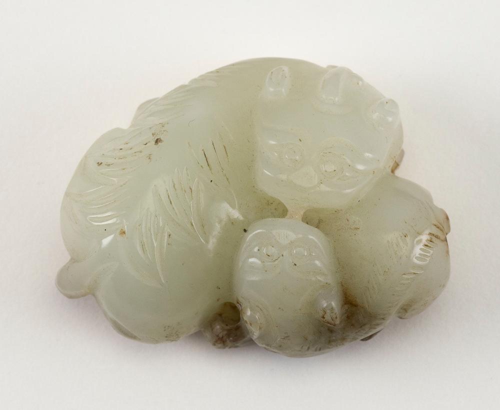 CHINESE CARVED PALE JADE GUARDIAN