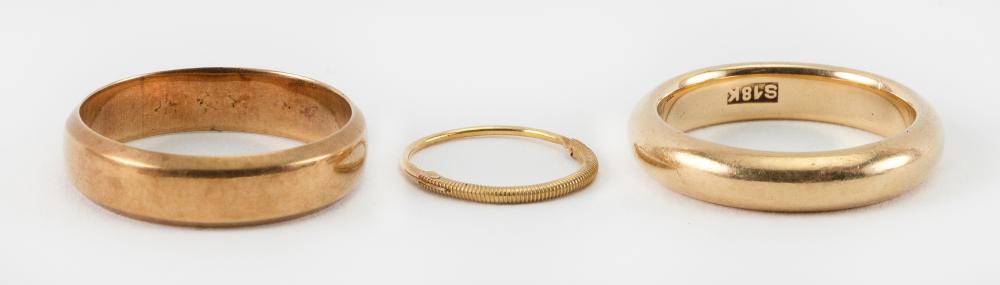 TWO GOLD BANDS AND ONE EARRING 34e1e7