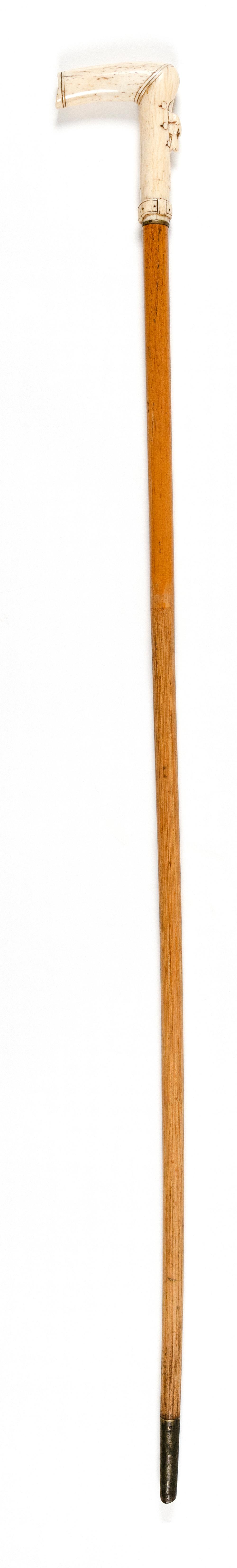 * CANE WITH CARVED BONE HANDLE