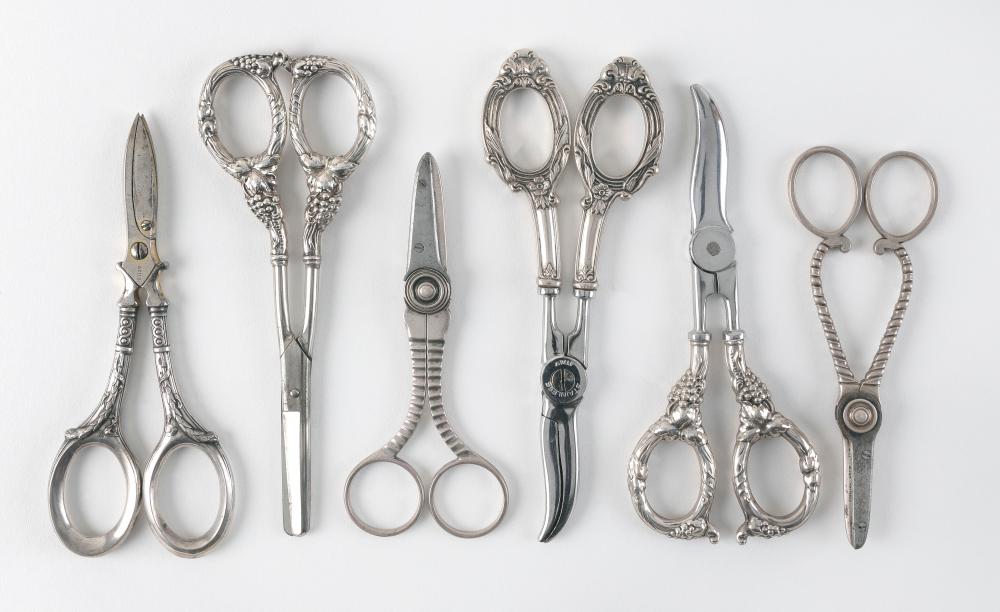 SIX PAIRS OF STERLING SILVER-HANDLED