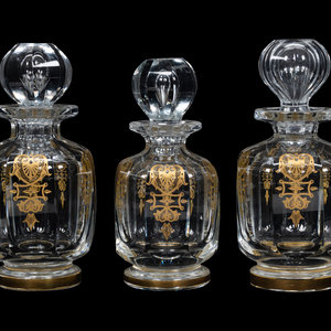 A Set of Three Baccarat Glass Decanters 34e6a1