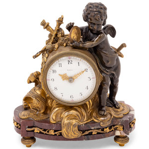 A Louis XV Style Gilt and Patinated