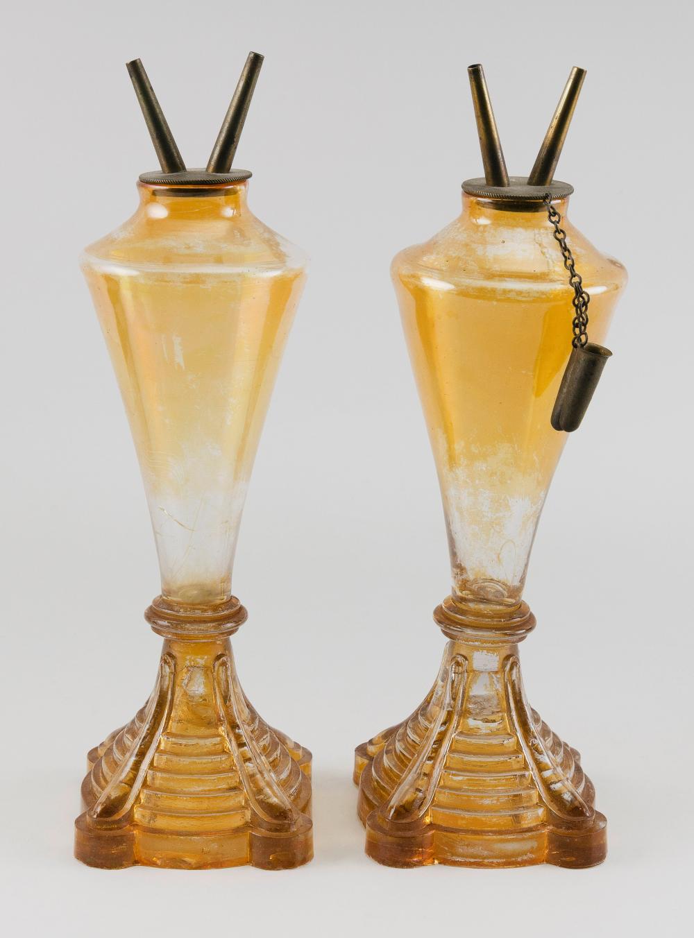 PAIR OF AMBER SANDWICH GLASS LAMPS