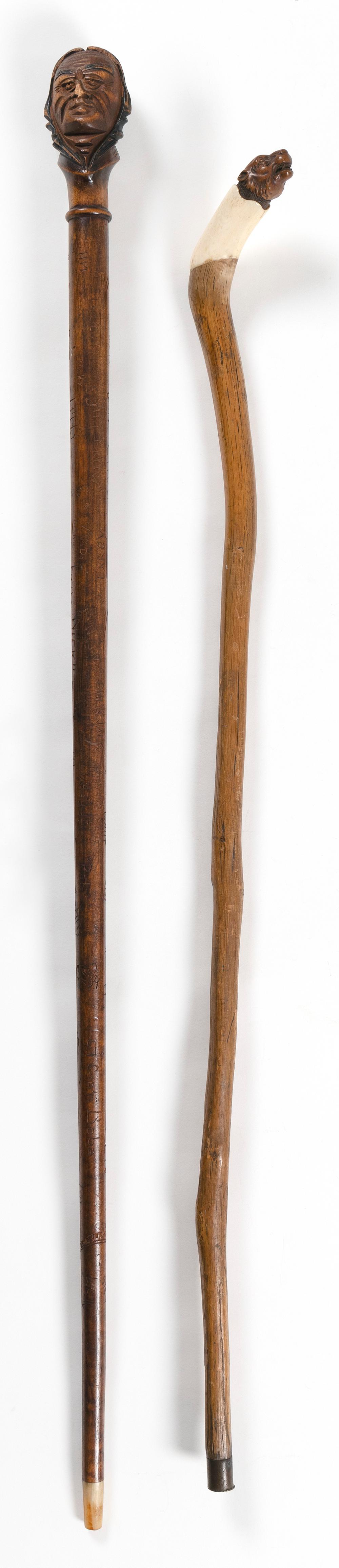 TWO CARVED WOODEN CANES 20TH CENTURY