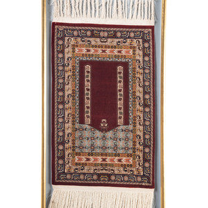 A Turkish Silk Rug 
20th Century
mounted