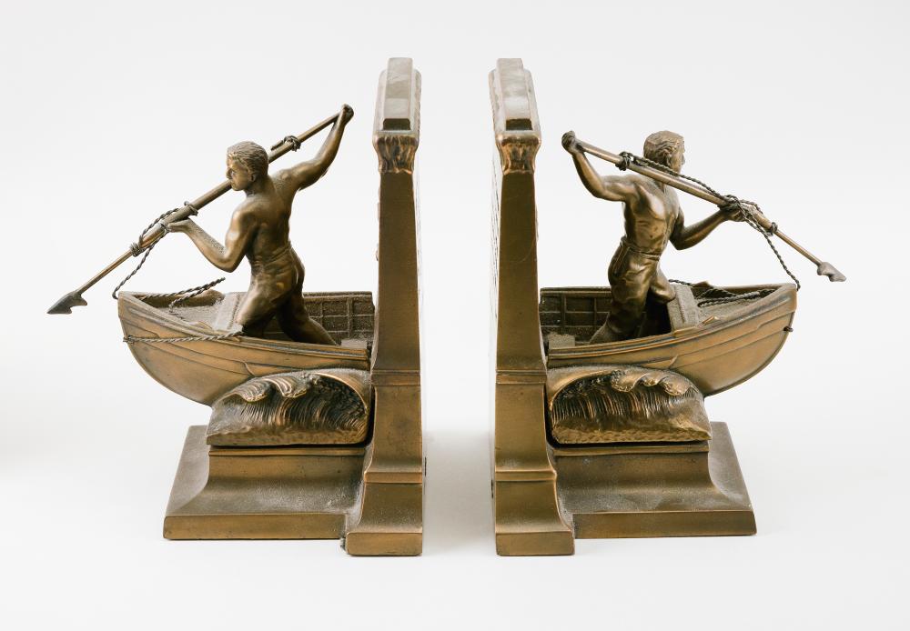 PAIR OF CAST METAL WHALEMAN BOOKENDS