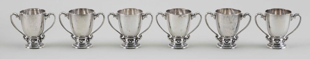 SIX STERLING SILVER MINIATURE TROPHIES