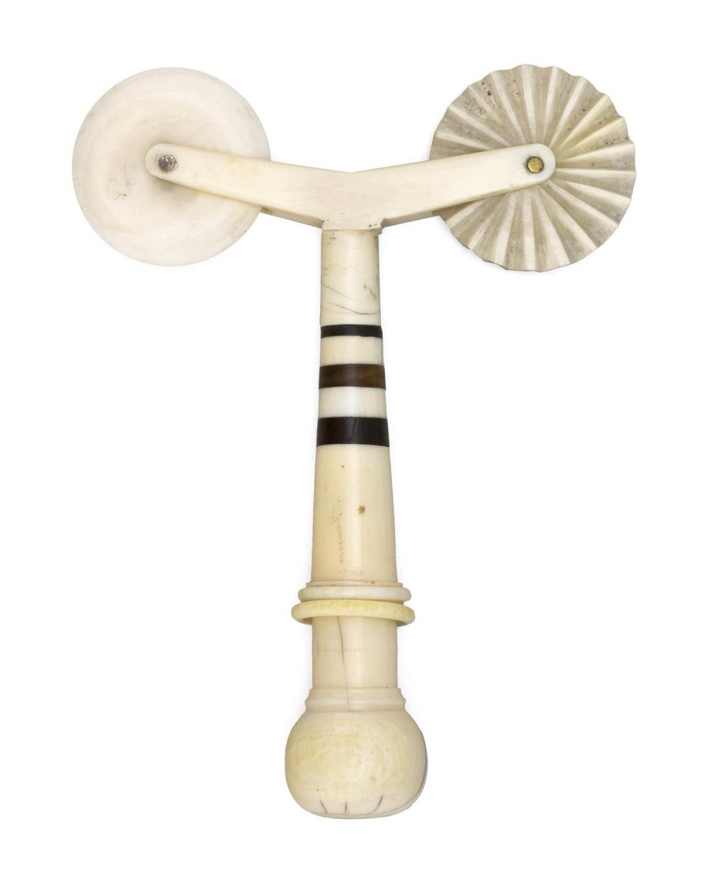 WHALE IVORY AND WALRUS IVORY DOUBLE WHEEL 34f02e